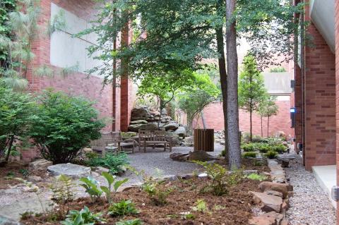 Scenic seating and trees in the Oklahoma Canyon Garden